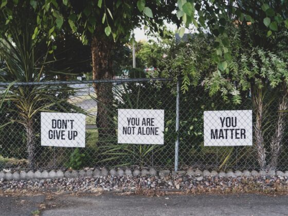 don't give up. You are not alone, you matter signage on metal fence